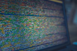 laptop screen with coding image